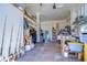 Spacious garage with storage shelves and room for projects, perfect for hobbyists or car enthusiasts at 6801 Nowiki Ave, Hudson, FL 34667