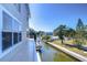 Scenic waterfront view from a home's porch, highlighting the property's unique location at 6801 Nowiki Ave, Hudson, FL 34667