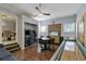 Spacious game room with a shuffleboard table, arcade games and cozy seating at 1101 N Betty Ln, Clearwater, FL 33755