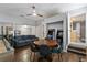 Game room with pool table, arcade games, a round table and a sofa at 1101 N Betty Ln, Clearwater, FL 33755
