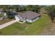 Aerial view of the home, highlighting the roof, landscaping, and curb appeal at 11134 Horned Owl Rd, Weeki Wachee, FL 34614