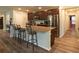 Well-equipped kitchen with stainless steel appliances, granite counters, and counter seating at 11134 Horned Owl Rd, Weeki Wachee, FL 34614