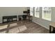 Bright office space with natural light, showcasing desk area and musical instrument at 11134 Horned Owl Rd, Weeki Wachee, FL 34614
