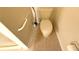 Toilet area features a hand rail and tiled floor at 11204 Clear Oak Cir, New Port Richey, FL 34654