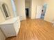 This bright bedroom shows wood floors and wicker furniture at 11204 Clear Oak Cir, New Port Richey, FL 34654