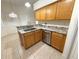 Well-equipped kitchen area features granite counters, stainless steel appliances, and ample cabinet space at 11204 Clear Oak Cir, New Port Richey, FL 34654