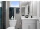 Well-lit bathroom featuring modern fixtures and vanity at 17026 Shell Bay Dr, Land O Lakes, FL 34638
