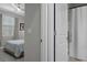Bedroom with large window for lots of natural light, leading into the en suite bathroom at 17026 Shell Bay Dr, Land O Lakes, FL 34638