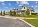 Attractive clubhouse with modern architecture surrounded by lush landscaping, and manicured grass at 17026 Shell Bay Dr, Land O Lakes, FL 34638