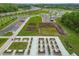 Aerial view of the community garden featuring decorative raised beds, and parking for the residents at 17026 Shell Bay Dr, Land O Lakes, FL 34638