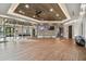 Bright exercise room with mirrors, wood floors, and state-of-the-art equipment at 17026 Shell Bay Dr, Land O Lakes, FL 34638