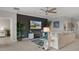Cozy living room featuring a modern entertainment center, comfortable seating, and stylish decor at 17026 Shell Bay Dr, Land O Lakes, FL 34638