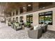 Outdoor lounge with comfortable seating and views of the pool and surrounding landscape at 17026 Shell Bay Dr, Land O Lakes, FL 34638