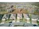 Street view of multiple homes near a lake in a vibrant community at 18629 Coastal Shore Ter, Land O Lakes, FL 34638