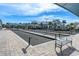 Outdoor recreation area featuring well-maintained bocce ball courts and shaded seating at 18629 Coastal Shore Ter, Land O Lakes, FL 34638