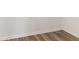 Corner of room showing hardwood flooring and white trim at 18629 Coastal Shore Ter, Land O Lakes, FL 34638