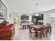 Open concept living space with kitchen, dining area, and living room in view at 19504 Lily Pond Ct, Brooksville, FL 34601