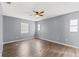 Inviting bedroom with wood floors and natural light at 4503 Higate Rd, Spring Hill, FL 34609