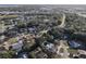 Residential neighborhood featuring a variety of homes nestled among mature trees and winding streets at 5518 Pinehurst Dr, Spring Hill, FL 34606
