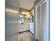 View of the bathroom showing the vanity with a double sink and white cabinets at 5518 Pinehurst Dr, Spring Hill, FL 34606