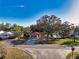 Charming single Gathering home with mature landscaping and long driveway at 5518 Pinehurst Dr, Spring Hill, FL 34606