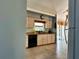 Well-lit kitchen area with modern appliances, generous countertop space, and neutral-colored cabinets at 5518 Pinehurst Dr, Spring Hill, FL 34606