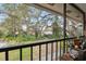 Relaxing balcony view overlooking lush greenery and nearby homes at 6002 Laketree Ln # L, Temple Terrace, FL 33617