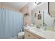 Clean bathroom with updated sink, toilet, and shower-tub combination at 6002 Laketree Ln # L, Temple Terrace, FL 33617