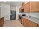 Modern kitchen featuring stainless steel appliances, granite countertops, and ample cabinet space at 12055 Lake Blvd, New Port Richey, FL 34655