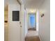 Hallway with carpet and neutral decor at 13103 Cypress Hill Dr # B2, Hudson, FL 34669