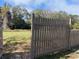 Spacious, mostly-fenced grassy backyard, ideal for recreation and outdoor enjoyment at 1817 Dartmouth Dr, Holiday, FL 34691