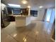 Open concept kitchen featuring an island and stainless steel appliances at 1817 Dartmouth Dr, Holiday, FL 34691