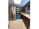 Kitchen with stainless steel refrigerator, microwave, and oven at 1817 Dartmouth Dr, Holiday, FL 34691