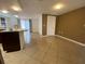 View of kitchen leading to the main living area at 1817 Dartmouth Dr, Holiday, FL 34691