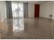 Open living room with lots of natural light and tiled floors at 1817 Dartmouth Dr, Holiday, FL 34691
