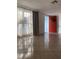 Open and bright living room with tile floors and lots of natural light at 1817 Dartmouth Dr, Holiday, FL 34691