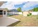 The backyard features a screened pool and storage shed at 2013 Meredith Dr, Spring Hill, FL 34608