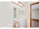 Bathroom with vanity, mirror, and a white sink at 2013 Meredith Dr, Spring Hill, FL 34608