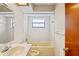 Bathroom with a tub, shower, and vanity at 2013 Meredith Dr, Spring Hill, FL 34608