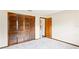 Carpeted bedroom with closet and an ensuite at 2013 Meredith Dr, Spring Hill, FL 34608