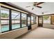 View of enclosed back patio with swimming pool at 2013 Meredith Dr, Spring Hill, FL 34608