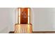 Open entryway featuring a dark wood door and patterned flooring at 2013 Meredith Dr, Spring Hill, FL 34608