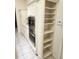 Kitchen details showcasing built-in appliances, white cabinets, and extra pantry storage at 355 Royal Palm Way, Spring Hill, FL 34608