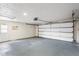 Spacious garage offers ample storage space and convenient access to the home's interior at 3736 Sail Dr, New Port Richey, FL 34652