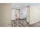 Bright kitchen with modern appliances and a refrigerator, seamlessly connecting to other living spaces at 3736 Sail Dr, New Port Richey, FL 34652