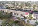 Aerial view of waterfront condominium complex on a canal with boat docks at 4533 Marine Pkwy # 206, New Port Richey, FL 34652