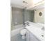 Clean bathroom with a tub, shower, sink, and toilet with neutral colors at 4533 Marine Pkwy # 206, New Port Richey, FL 34652