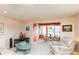 Cozy living room with neutral carpet, comfortable seating, and dining area with views at 4533 Marine Pkwy # 206, New Port Richey, FL 34652