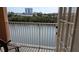Balcony overlooking water with seating, providing a tranquil outdoor space at 5000 Culbreath Key Way # 9-221, Tampa, FL 33611