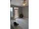 Spacious living room with a decorative ceiling fan, wood-look tile flooring and nautical decor at 5000 Culbreath Key Way # 9-221, Tampa, FL 33611